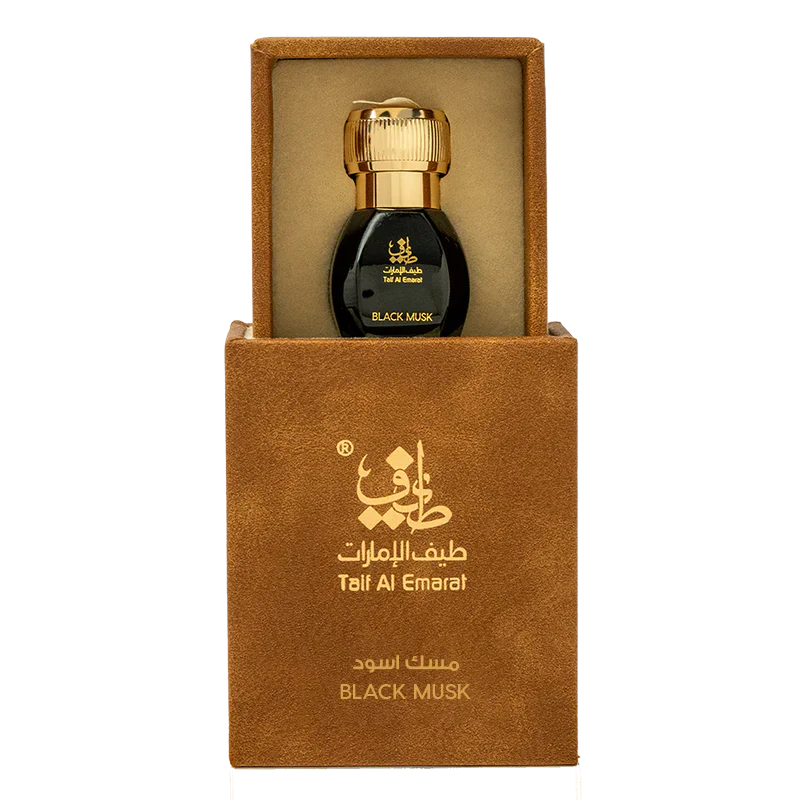 Black Musk oriental oil bottle 1tola resting inside open luxury box - long lasting black musk oil UAE