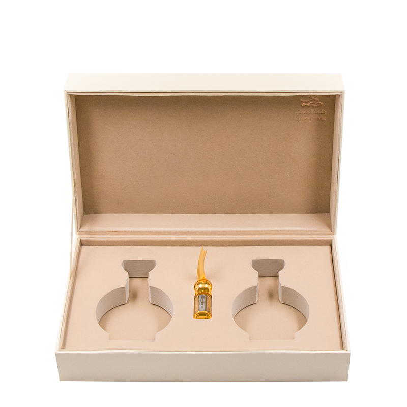 Luxury gift box holding oriental oil with empty slots - best wedding gifts dubai