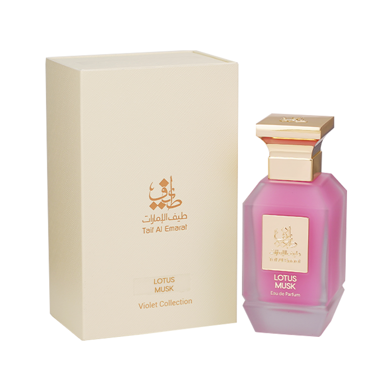 Lotus Musk women's perfume bottle 75ml standing beside cream elegant perfume box embossed with taif al emarat logo in golden color - lotus perfume