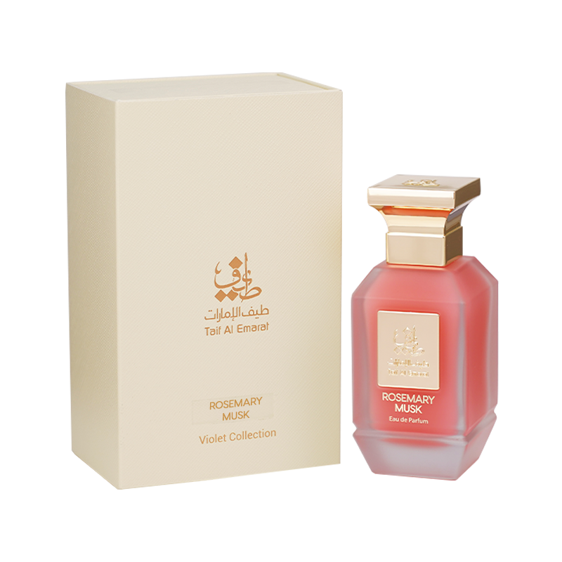 Rosemary Musk women's perfume bottle 75ml standing beside cream fancy perfume box embossed with taif al emarat logo in golden color - rosemary perfume