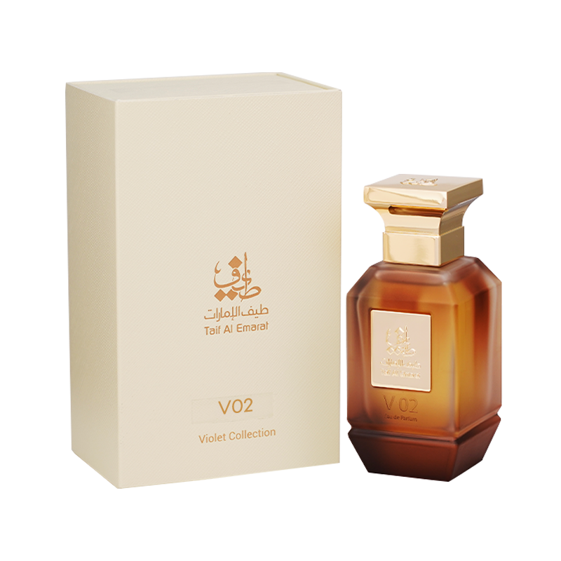 زجاجة عطر V02 للجنسين 75 مل بجانب علبة هدايا كريمية أنيقة، زيت العود - عطور العود