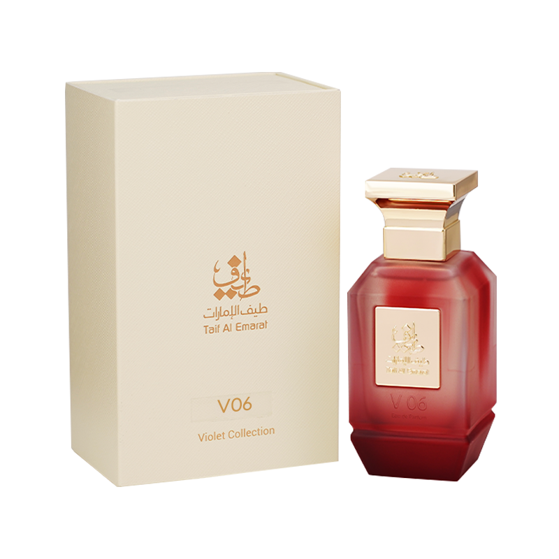 V06 women's perfume bottle 75ml standing beside luxury cream box with taif al emarat golden logo - ylang ylang perfume