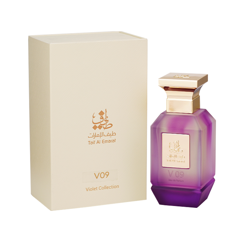 V09 women's perfume bottle 75ml standing beside elegant cream box with taif al emarat golden logo - fragrant violet flower fragrance in uae