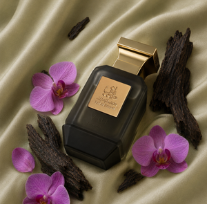 V04 unisex perfume bottle 75ml surrounded by orchids and oud wood - best black oud perfume Abu Dhabi