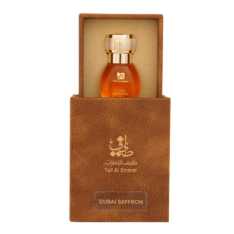 Dubai Saffron oriental oil bottle 1tola resting inside brown luxury arabic oil box - high quality saffron oil