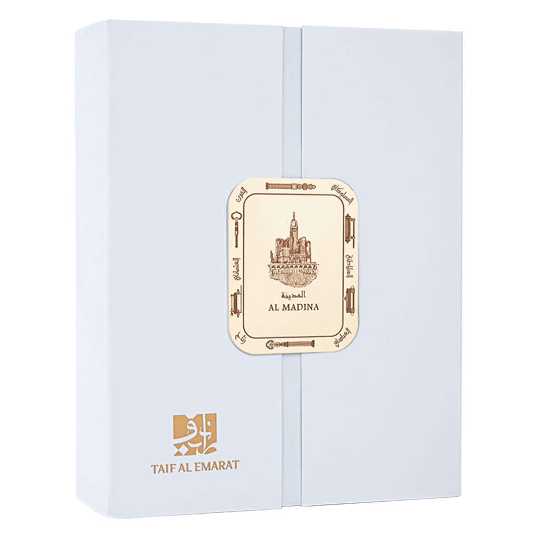 علبة عطر بيضاء فاخرة مغلقة بختم ذهبي وصورة مدينة مكة المكرمة لزجاجة عطر المدينة 80 مل - عطر مسك