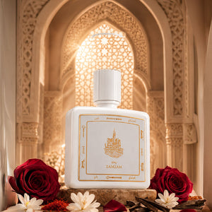 Zamzam perfume bottle 80ml from taif al emarat perfumes, surrounded by roses and wood - elegant cambodian oud perfume