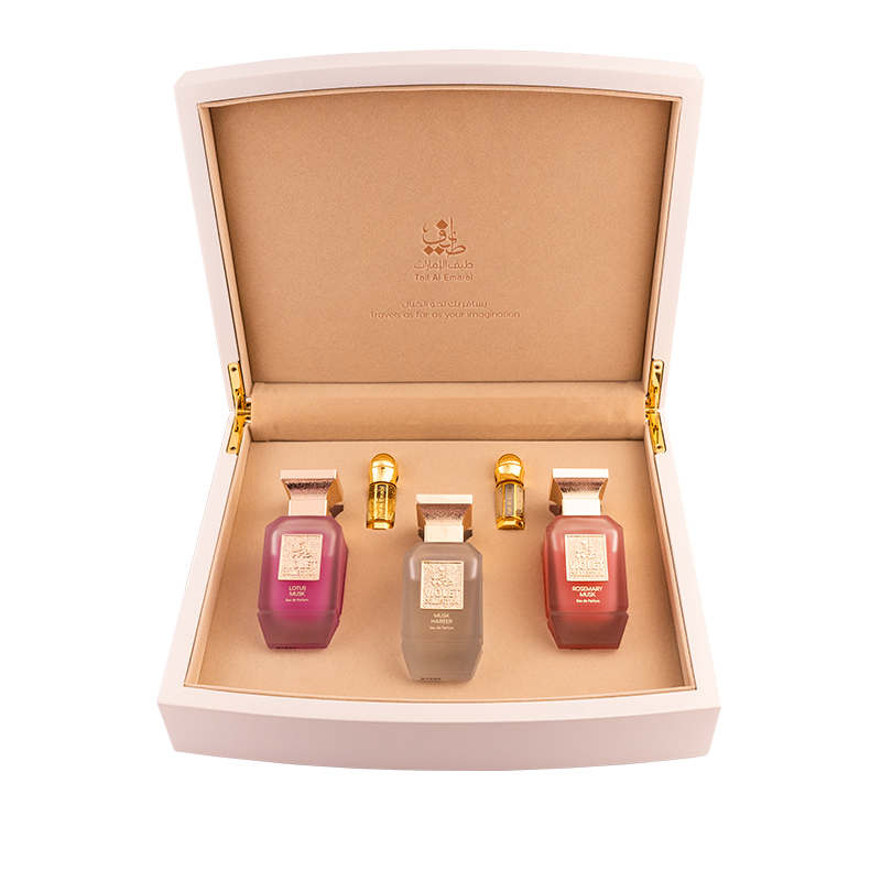 Luxury gift box holding three perfumes and oriental perfume oils elegantly, Musk Violet Collection - luxury wedding anniversary gift for wife in dubai