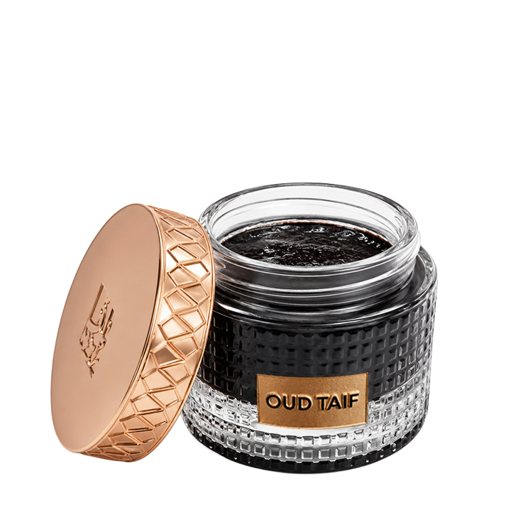 Open frosted jar revealing oud bakhoor pieces - Bakhour Oud Taif - luxury arabic smell bakhoor in uae