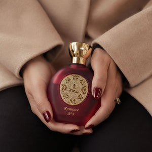 Hands holding ROMANCE N°3 women's perfume bottle 75ml from taif al emarat perfumes - best luxury women's perfume
