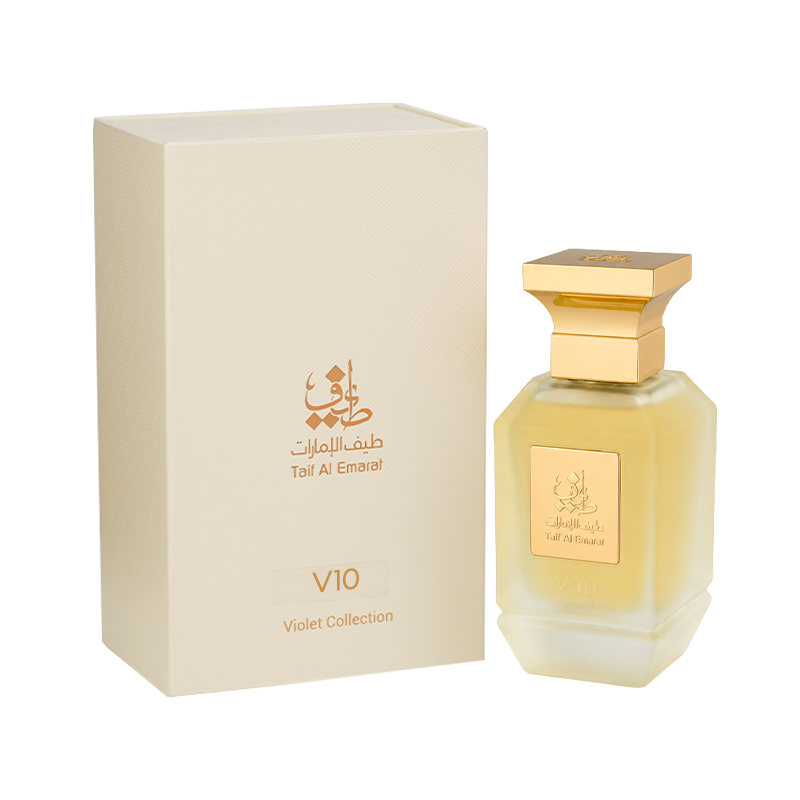 V10 unisex perfume bottle 75ml standing beside fancy cream box with taif al emarat golden logo - oriental perfumes