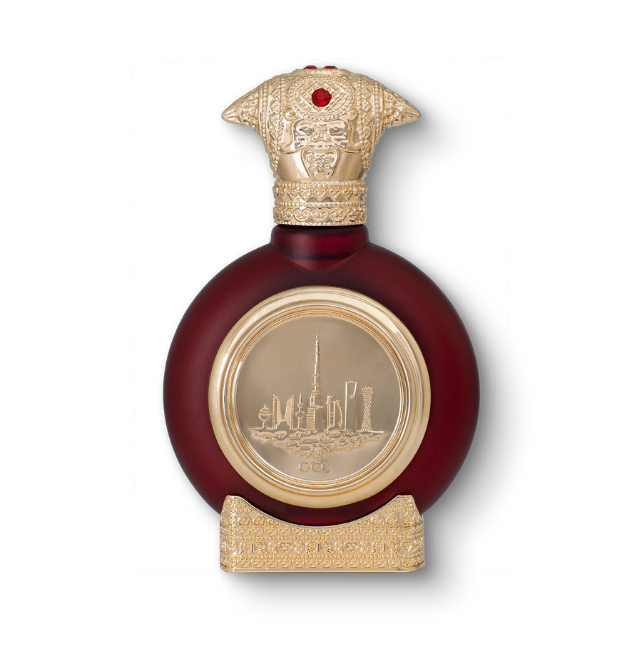 GCC unisex perfume bottle 75ml - maroon luxury perfume bottle, with a luxurious golden bottom and an embossed golden cap, the center of the perfume bottle embossed with a golden portrait of gcc - luxurious iris fragrance