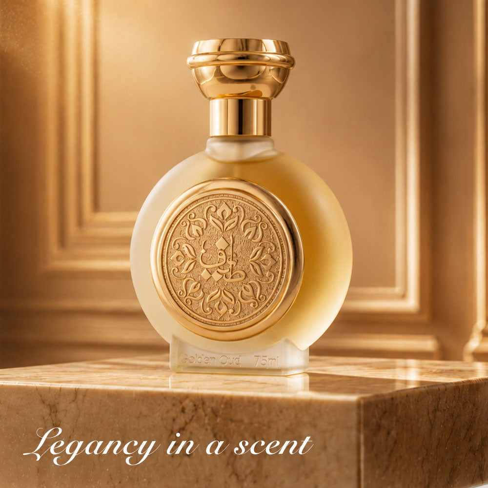 GOLDEN OUD unisex perfume bottle 75ml on marble beside golden panels, oud gold perfume