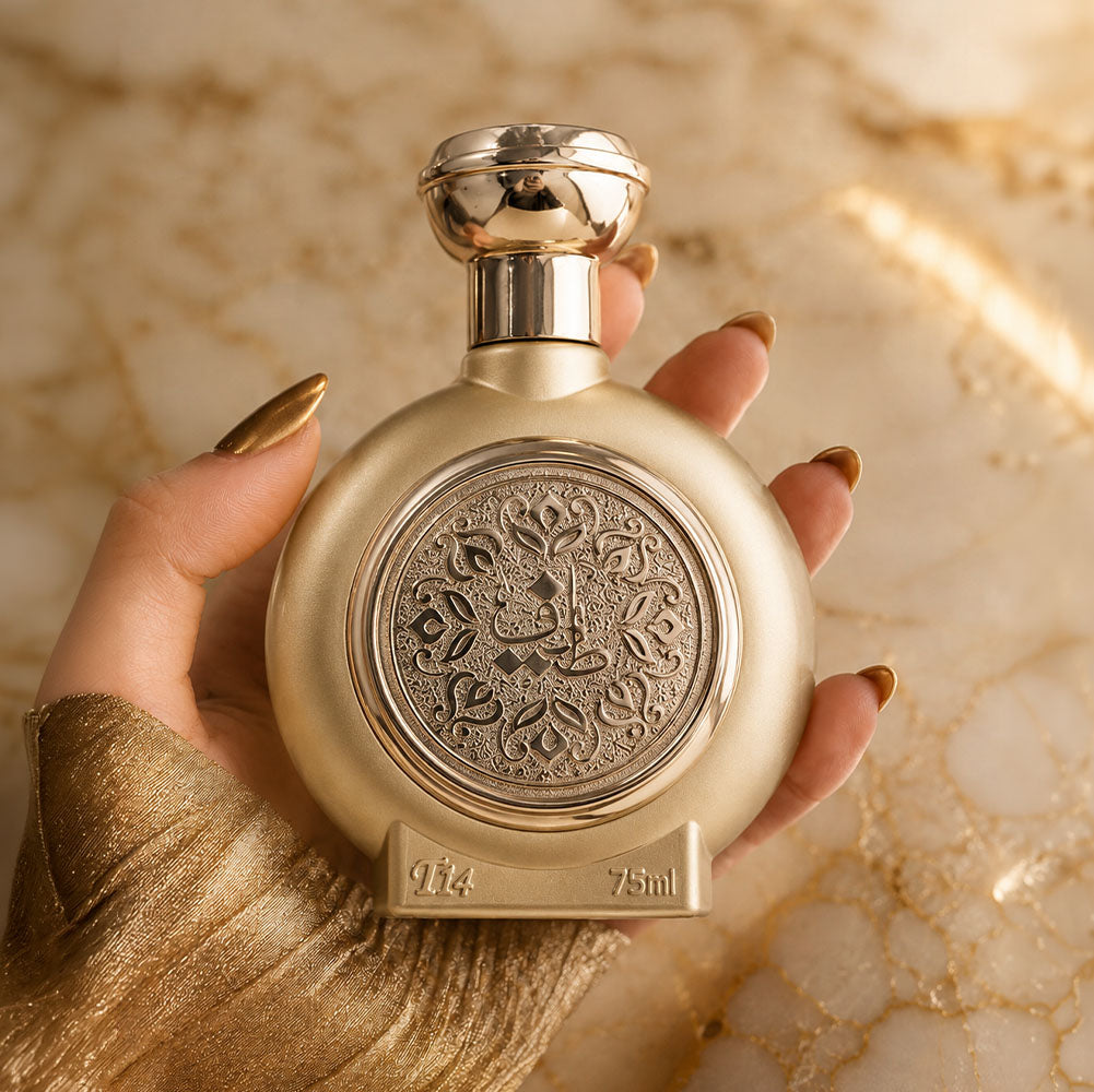 woman hand holding TAIF 14 unisex perfume fancy well designed bottle 75ml from taif al emarat perfumes - top amberwood fragrance