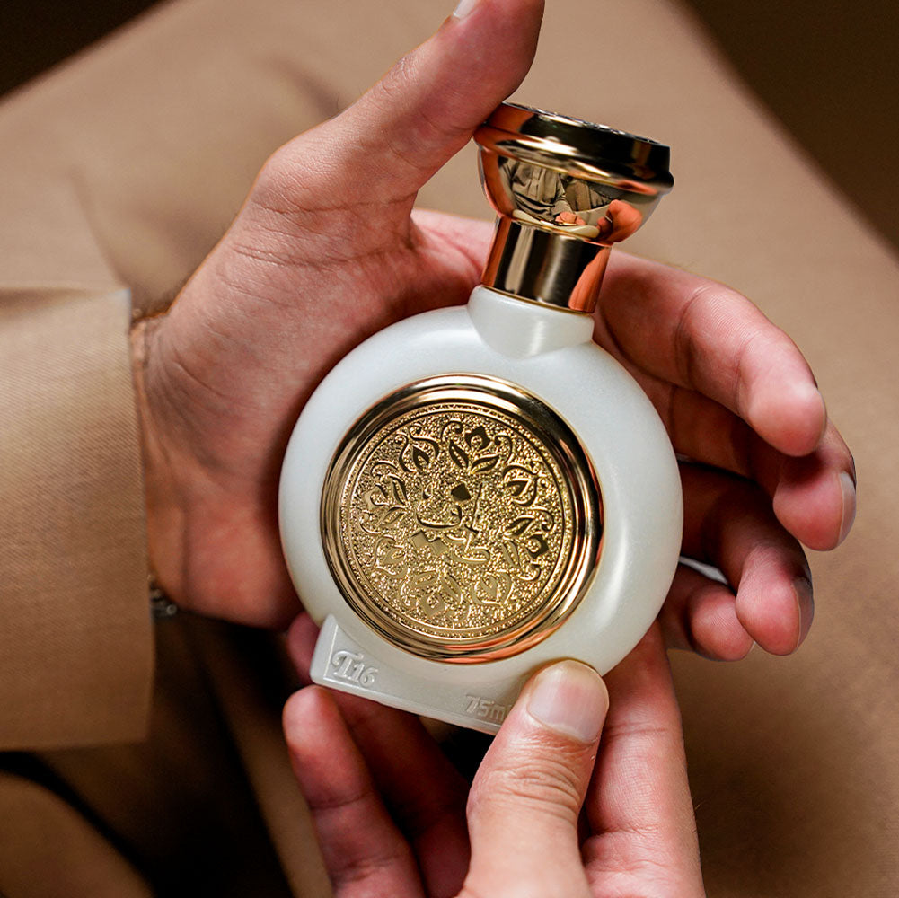 Hands holding TAIF 16 unisex perfume bottle 75ml from taif al emarat perfumes - online fragrance stores - best Cambodian oud