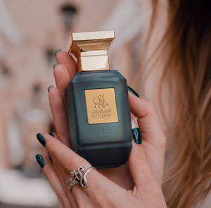 Hands holding V03 women's perfume bottle 75ml from taif al emarat perfumes - best ladies perfume in dubai