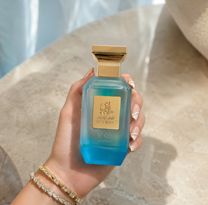 Hand with holding luxury V05 men's perfume bottle 75ml from taif al emarat perfumes - best fresh mens fragrance in dubai