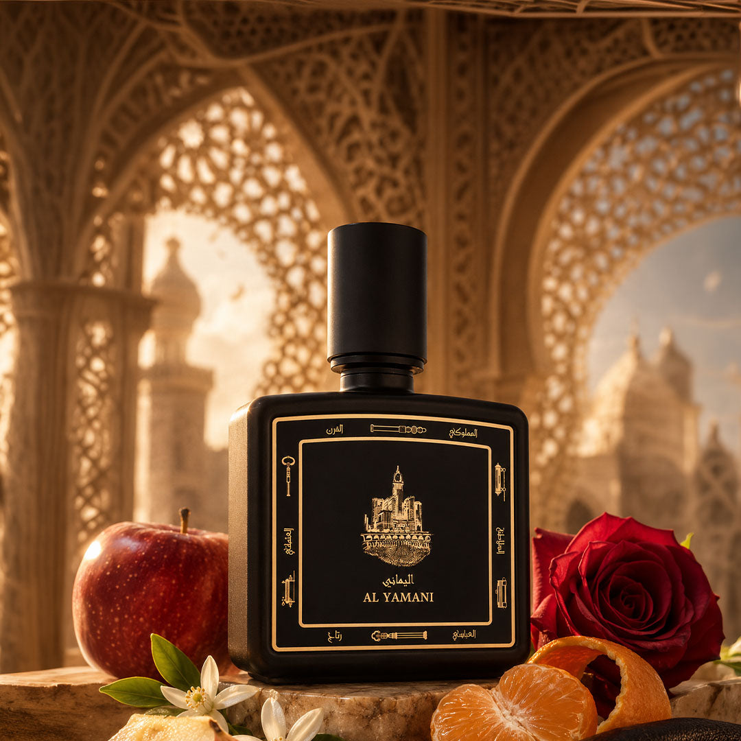 Al Yamani perfume bottle 80ml surrounded by apple, rose and orange - powerful musk and amber perfume