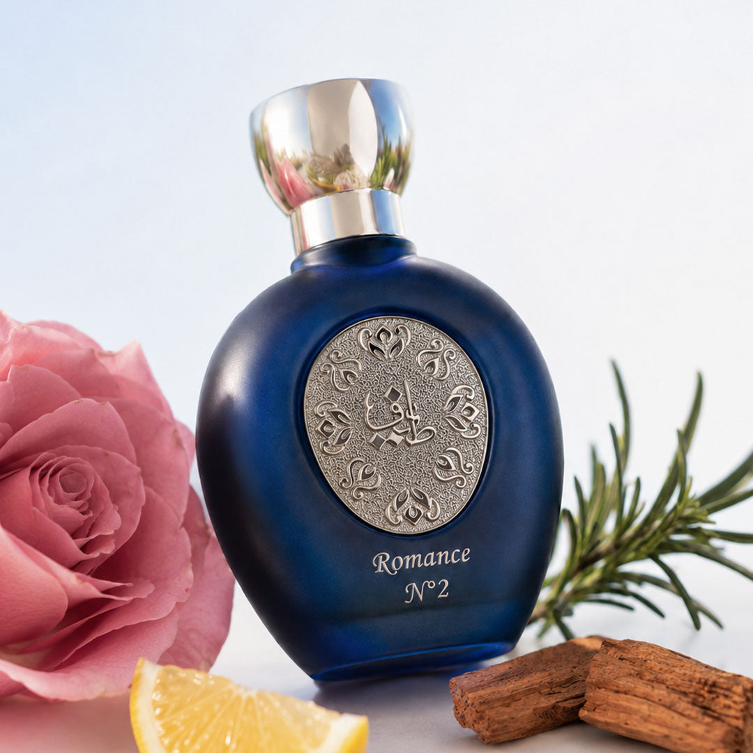 ROMANCE N°2 women's perfume bottle 75ml beside rose and citrus wedge - top latest fragrance for women