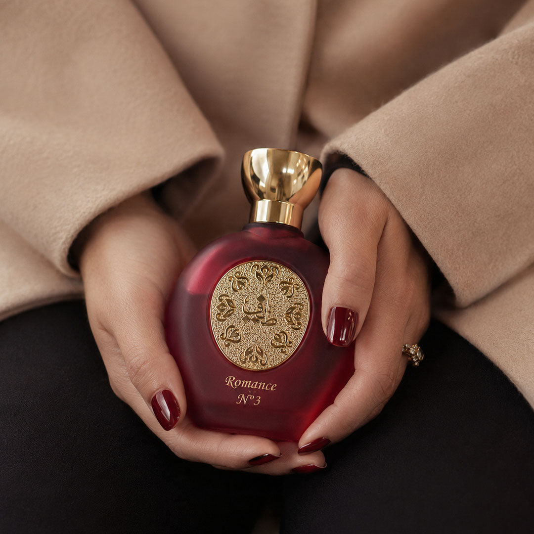 Hands holding ROMANCE N°3 women's perfume bottle 75ml from taif al emarat perfumes - best luxury women's perfume