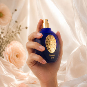 Hand holding ROMANCE N°5 women's perfume bottle 75ml from taif al emarat perfumes - top luxury perfume for women