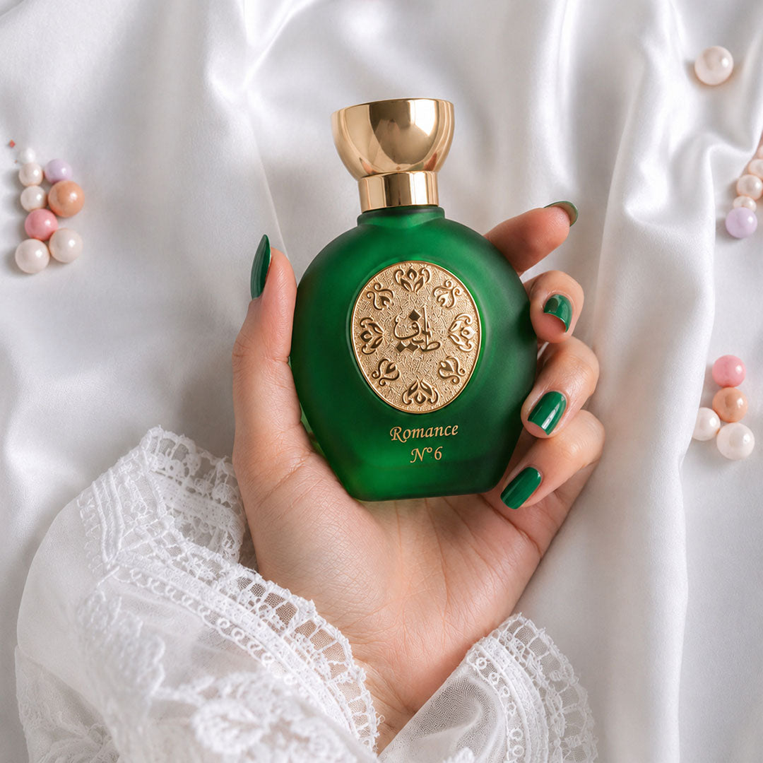 woman hand holding ROMANCE N°6 women's perfume bottle 75ml from taif al emarat perfumes - elegant royal perfume