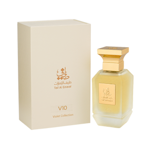 V10 unisex perfume bottle 75ml standing beside fancy cream box with taif al emarat golden logo - best arabian oud fragrance in dubai